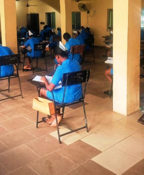 Students of SON Iyienu writing exam
